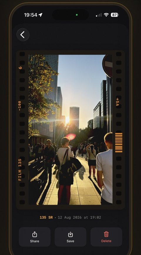A 35mm negative frame of a sunny street, straight off the roll